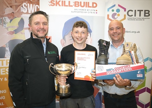 Male presented with cup, certificate and boots