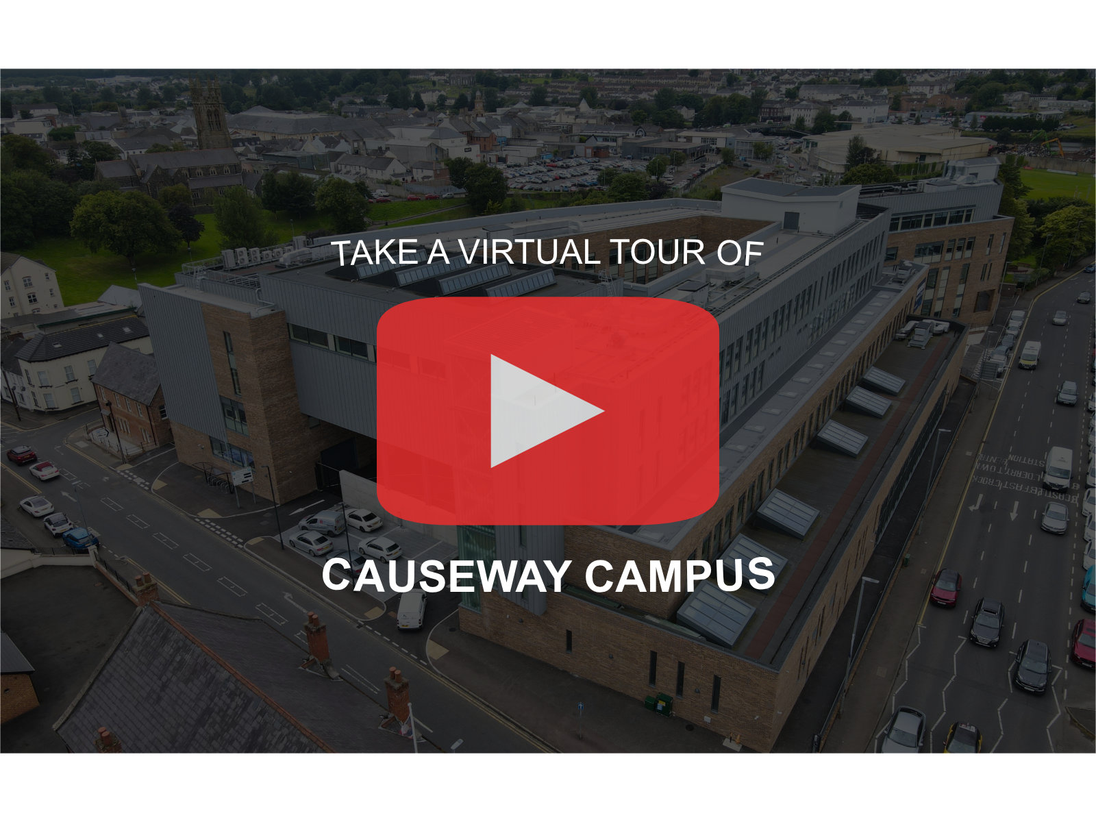 Causeway Campus in background with YouTube play button in centre surrounded by text Take a virtual tour of Causeway Campus.